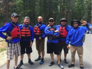 Figure 3: Guo Cheng, fourth from left, enjoyed whitewater rafting with his 2016 summer internship work team.
