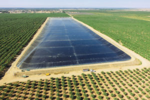 The proposal was to line the reservoir with a 30-mil, single-film, laminated (SFL) geomembrane because of the puncture resistance properties on one side and the hydrostatic resistance on the other side.