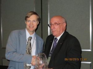 Tony Allen (left) was congratulated by the namesake of the L. David Suits Award (right).