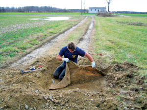 Geotextiles installed in 1972 at this Delaware test site were exhumed in 2007. Geosynthetic Institute director, George Koerner, examined this test sample. Photo courtesy of Fiberweb