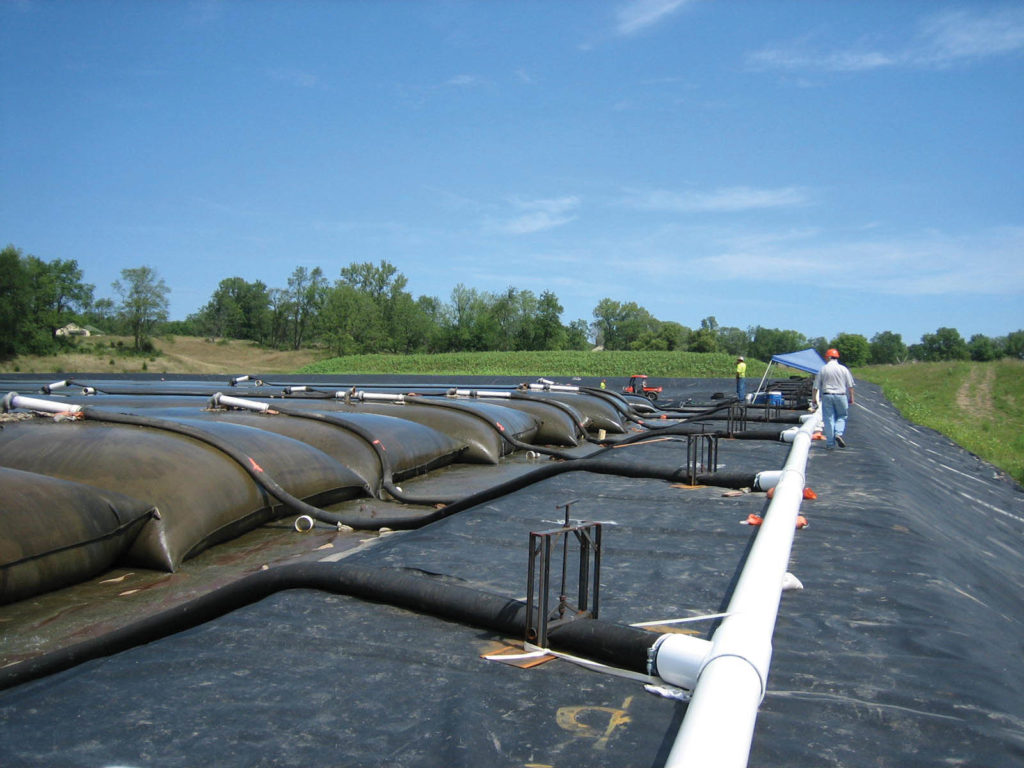 Geotextile Dispensing Rack CCR management using geotextile tubes - Geosynthetics Magazine