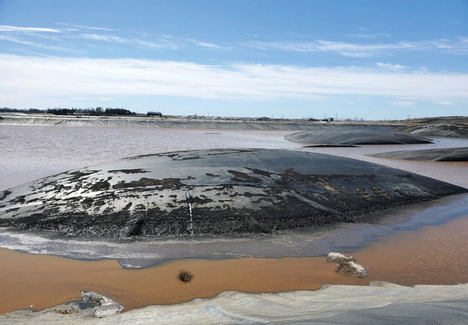 Methods To Estimate Pressures And Strains In Pond Geomembrane Bubbles